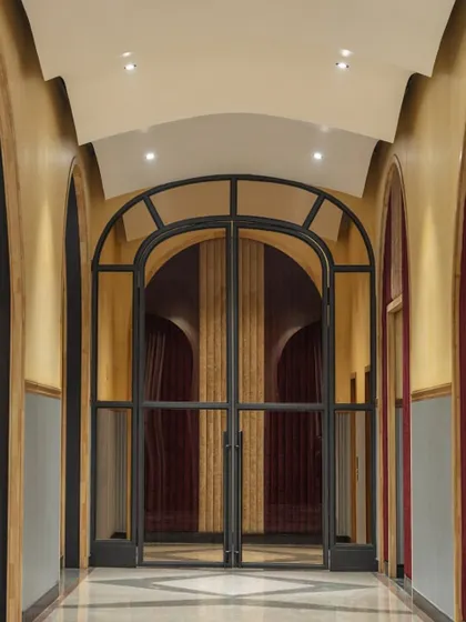 The entrance corridor at Nishtara features a series of grand arches, guiding guests into the main hall. The design draws from Gothic and Romanesque influences, creating a sense of anticipation and drama from the moment of arrival.