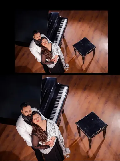 An overhead shot of a couple embracing by the grand piano, offering a unique perspective of the scene. This angle captures the intimacy of the moment beautifully.