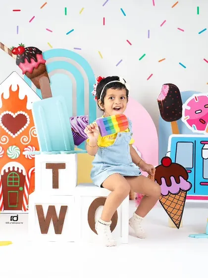 Celebrating turning two with a colorful and delicious-looking ice cream party.