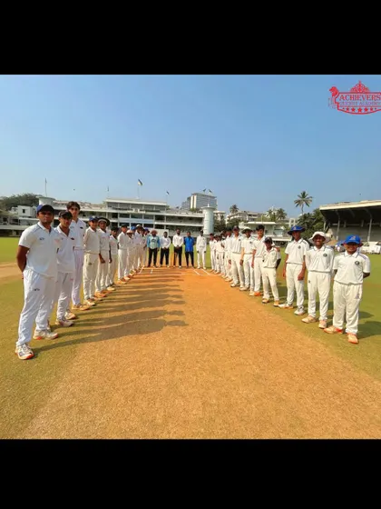 Both teams line up on the pitch at Brabourne Stadium, a day filled with sportsmanship and valuable on-field learning.