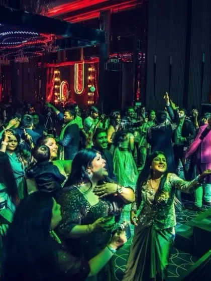 Our lead vocalist right in the middle of the dance floor, creating an unforgettable, interactive experience for the guests.