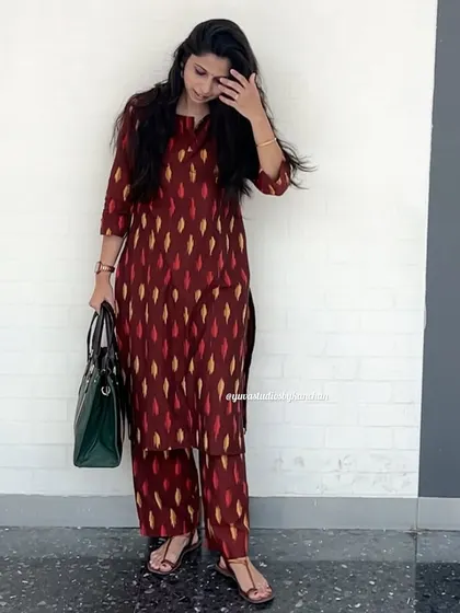 A full look at our versatile maroon Ikat kurta pant set. The classic straight cut and handloom fabric make it a timeless addition to your wardrobe.