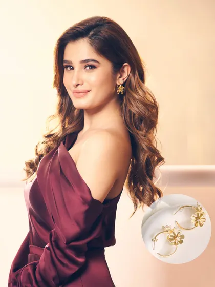 The lovely Rasha Thadani, a vision in my Bloom Bauble Trio Earrings. These delicate floral hoops add a touch of grace to any look.