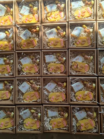 A large order of the yellow-themed baby shower gift boxes, showing my capacity for bulk orders.
