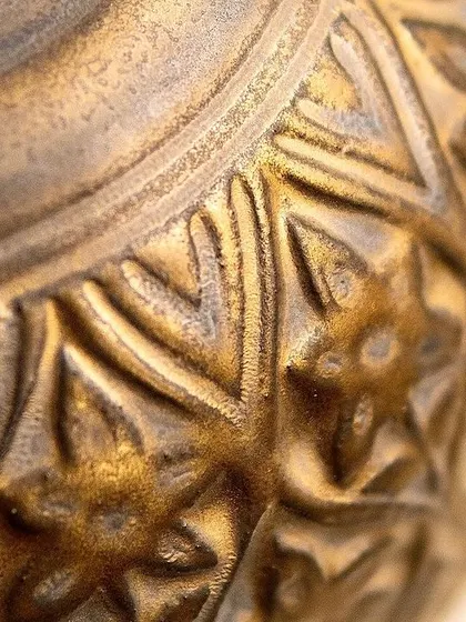 Another detailed look at the Medieval Gold glaze. The way it breaks over texture is what makes it a favorite for decorative and sculptural ceramic pieces.