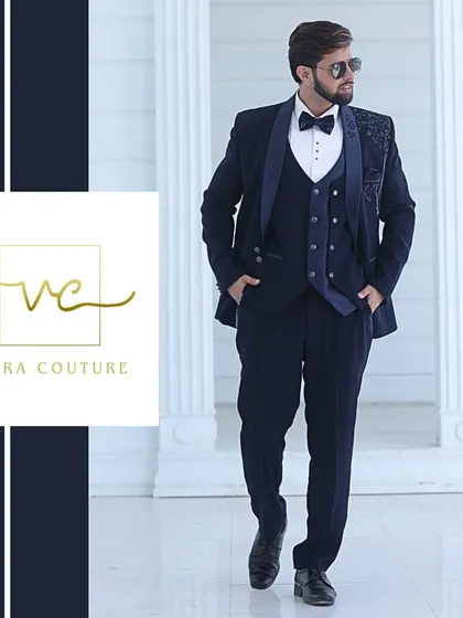 A professionally styled shot of our navy blue tuxedo, showing how it can be worn for a high-fashion look. We work with you to create a complete ensemble that reflects your personal style.