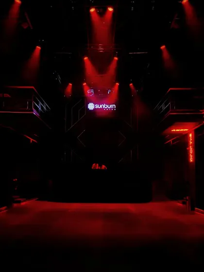 The calm before the storm. An empty Sunburn Union club, lit in red, waiting for the doors to open.