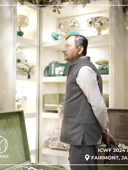 A quiet moment of admiration at our ICWF 2024 booth. The display shelves were curated to showcase the breadth of my collections, from silver decor to bespoke trousseau trunks.