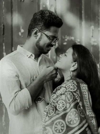 A beautiful black and white portrait of the couple, highlighting their expressions and the emotional connection between them.