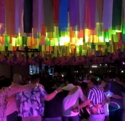 A moment of unity on the dance floor.