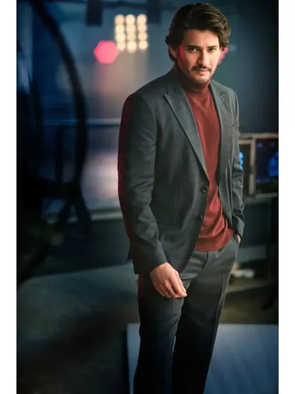 A simple suit check moment that turned into a great portrait. Mahesh Babu's sharp look in a turtleneck and blazer is a perfect example of classic, understated style.