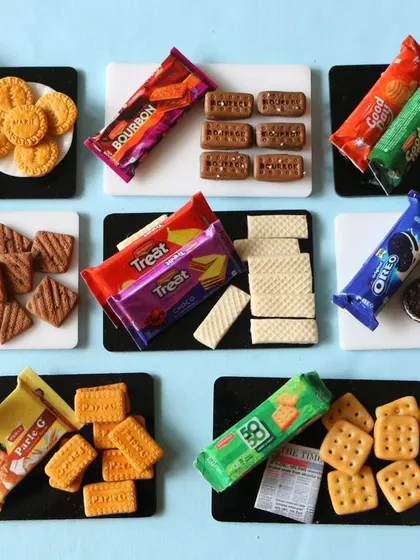 A beautiful flat lay of all 8 types of biscuits and their packets from the online course.