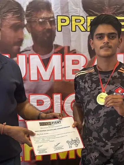 Amey, another one of our gold medalists, after his second-round TKO victory. Our fighters dominate in every discipline, from grappling to kickboxing.