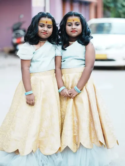 The twins of Aarvi, looking adorable in their matching pastel lehengas. It was a joy to design for them.