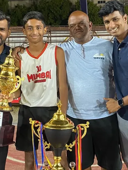 Celebrating with Jordan and the coaching staff after the big win in Kolhapur. It takes a team on and off the court.