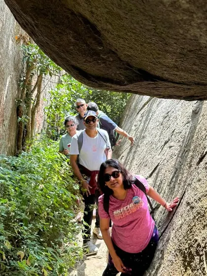 Navigating a narrow rock passage is a thrilling part of some of our treks. These natural challenges are excellent for building team trust and encouragement.