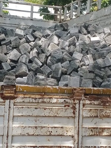 Another truckload of natural cobblestones, ready for transport to a client's site anywhere in South India.