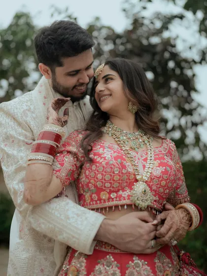 A sweet, candid moment between the couple after their Varmala ceremony.