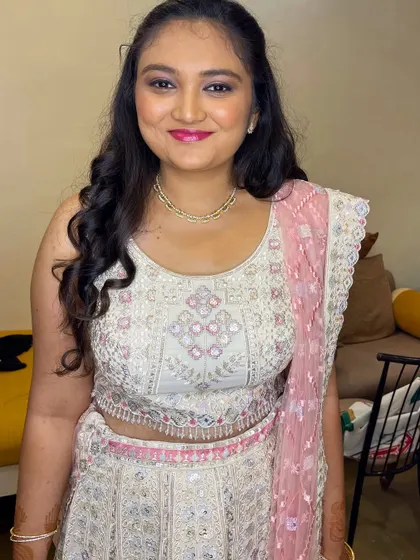 Tiana looking confident and beautiful. This is a perfect example of a modern party makeup look that's both glamorous and fresh.