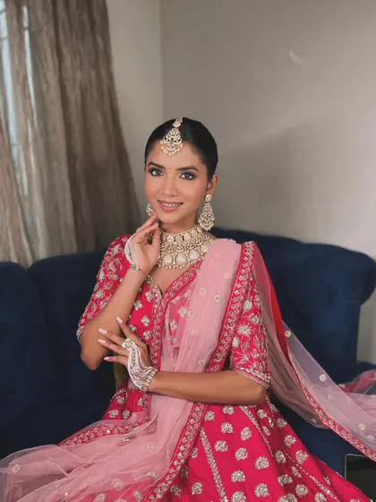 Her smile says it all. This look was designed to be both beautiful and comfortable, with a lightweight base and makeup that enhances her joyful expression.