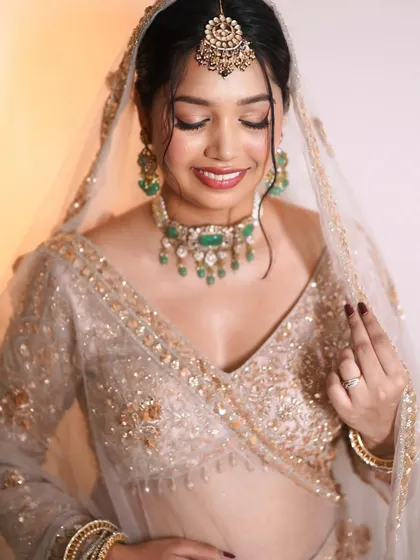 This is the essence of my work. A bridal look that is all about enhancing your natural beauty, giving you that lit from within glow. Notice the soft, skin like base and the gentle shimmer on the eyes that makes them sparkle with happiness.