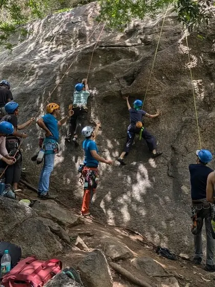 A typical scene at one of our Intro to Rock Climbing workshops. New climbers learn the ropes, supported by our experienced volunteers and cheering on their new friends. It’s a safe, fun, and encouraging environment to start your climbing journey.
