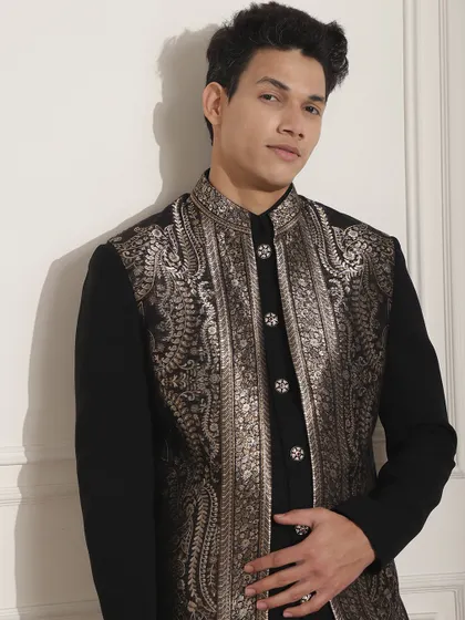 A closer view of the silver embroidery on this black Indo-Western jacket. The craftsmanship is evident in every single thread, creating a piece that is truly special.