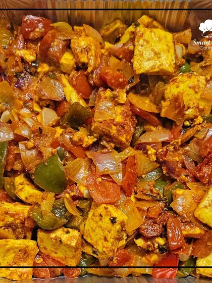 This Kadai Paneer is cooked with fresh bell peppers, onions, and a blend of aromatic spices. It's a vibrant and flavorful dish that pairs perfectly with naan or rice.