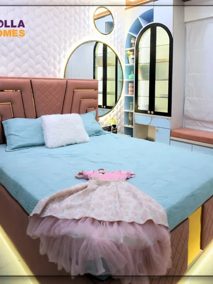 We had so much fun designing this teenage bedroom for two sisters. The room features a stylish pink headboard with gold accents and a beautiful 3D textured wall.