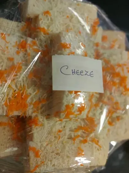 For a simple and universally loved option, we offer classic cheese sandwiches. They are a safe and delicious choice for events with a wide range of guests.