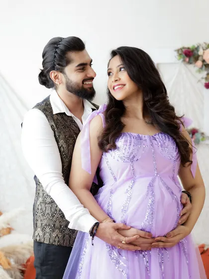 A joyful and romantic couple's portrait. Their happy expressions and loving embrace make this a heartwarming and beautiful photo.