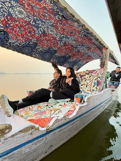 Duplicate of 75, showing the full view of the beautifully decorated boat.
