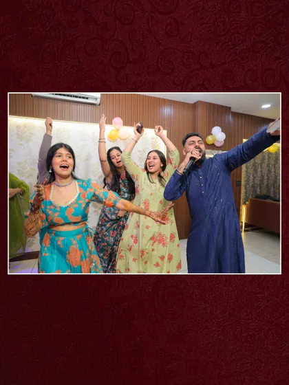 The best moments are often the unscripted ones. Here I am, sharing a laugh and a dance with the bride and her friends at a Mehndi party. It's about creating a comfortable, fun atmosphere where everyone feels like celebrating.