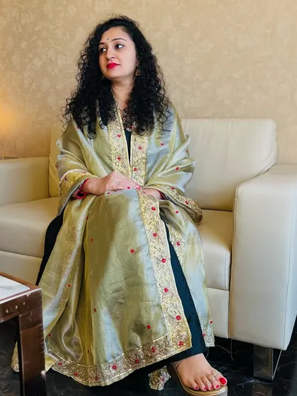 Pragathi Rishab Shetty looking elegant in a custom-designed Anarkali with a golden tissue dupatta.