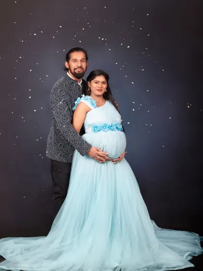 I make sure both of you look great together. This maternity shoot features one of my rental gowns with a matching blazer for the dad-to-be, creating a perfectly coordinated look.