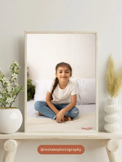 A beautifully framed portrait of a girl with a simple, genuine smile. Sometimes the most minimal setups create the most magical and timeless photos.