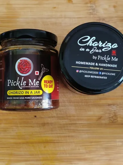 A close-up of our ready-to-eat Chorizo in a Jar. Made from authentic Goa pork sausages, it's a taste of vacation in every bite.