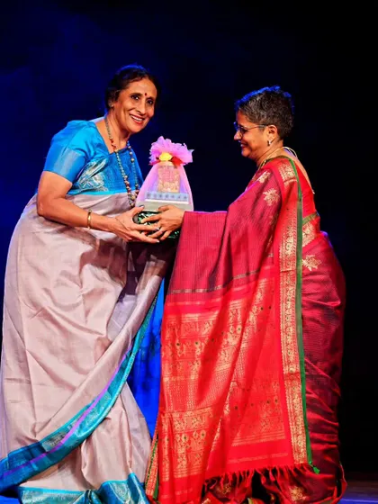 Honoring Guru Padma Murali at a student's performance. The presence and blessings of senior gurus are a great source of encouragement for young dancers.