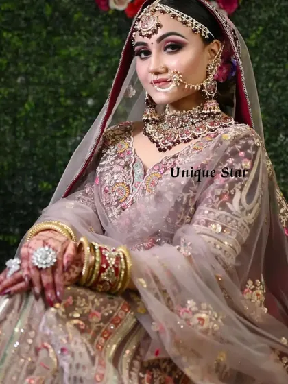 A perfect bridal portrait featuring one of my rental sets. This look includes a heavy choker, a delicate nath, and a statement maang tikka, all coordinated with a pastel embroidered lehenga.