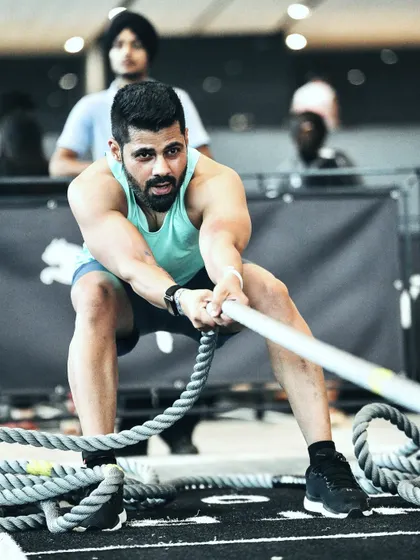 The sled pull is a brutal test of full-body strength and endurance. This is where your training, nutrition, and mental fortitude all come together.