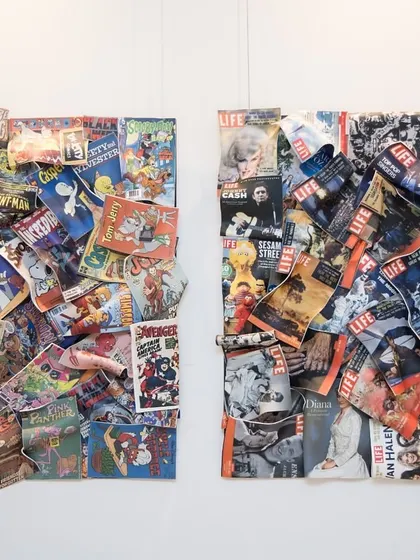 "Comic Confluence" and "Chronicles of Life" are two acrylic installations that pay tribute to visual storytelling. One celebrates the legacy of comic books, while the other features iconic covers from Life magazine.