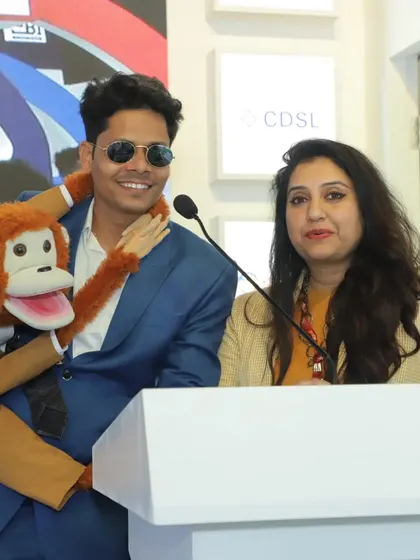 At the podium with an official from CDSL during an investor awareness event. These collaborations are key to reaching a wider audience and making financial knowledge accessible to all.
