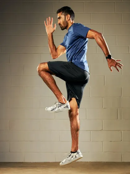 These are professional shots from a shoot, but they capture the essence of my training. Dynamic movements like plank shoulder taps, side lunges, and high knees are staples in my functional fitness programs.
