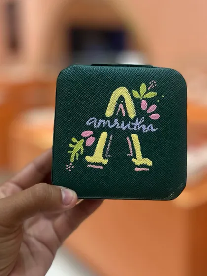 A close-up of a personalized jewelry box painted by a customer. I love seeing their creativity shine.
