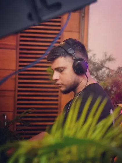 A profile shot from the same outdoor party, showing my focus on the music.