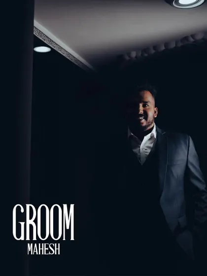 A moody and handsome portrait of the groom, Mahesh, ready for his reception.
