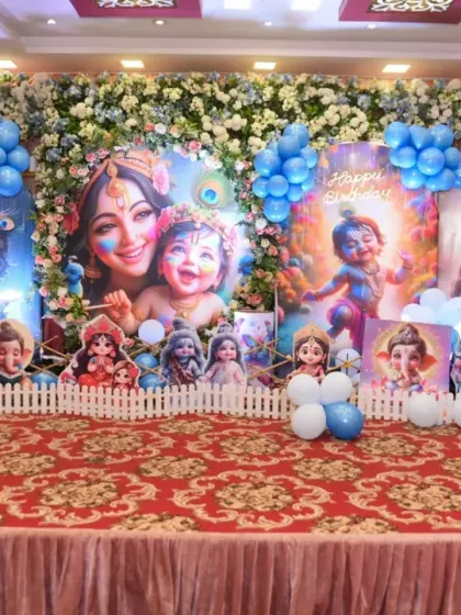 A detailed shot of the stage, showing the character cutouts and balloon arrangements.