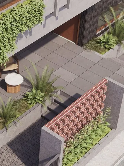 **Upcoming Residence, Ahmedabad:** A duplicate of image 10, showing the rendered entrance patio with its multi-level planters and brick screen wall.