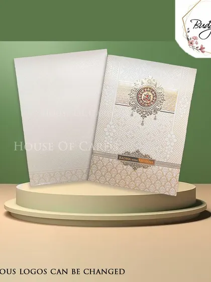 A simple and elegant invitation in white and beige, with a customizable religious logo to suit your ceremony.