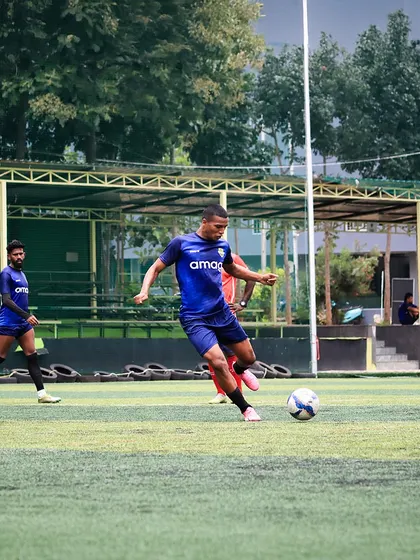 A player advances the ball with precision during a Super Division training session. Every drill is designed to improve ball control and decision-making under pressure.